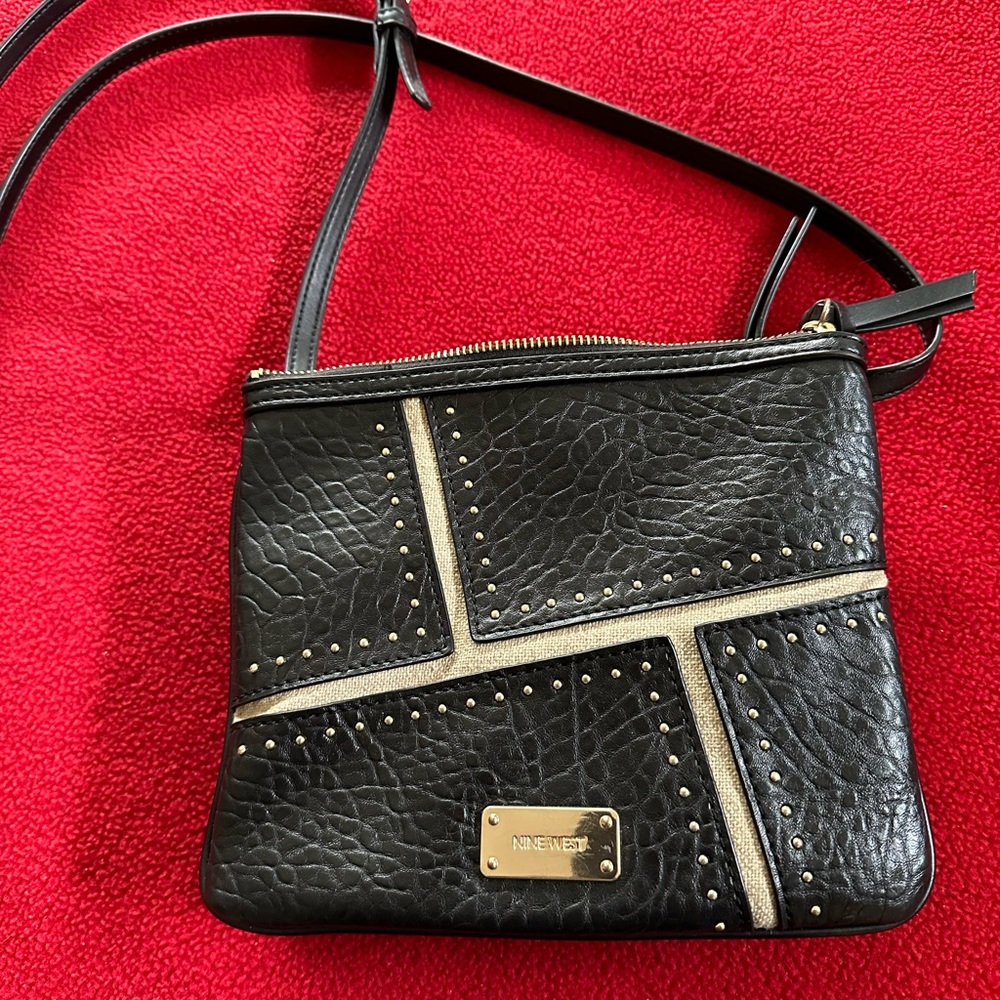 Black with tan design purse.  8.5 x 7.5